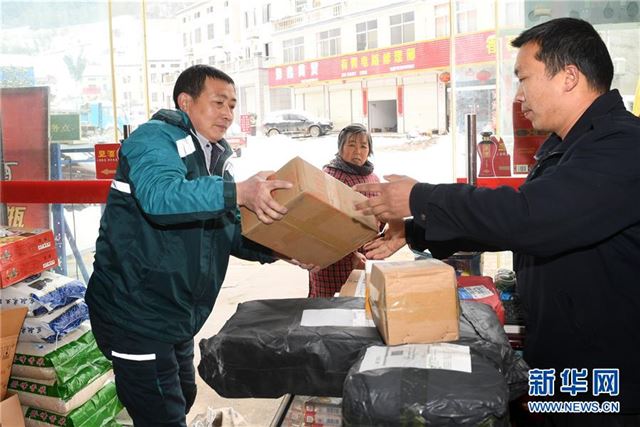 #（社会）（2）冰雪难阻投递路