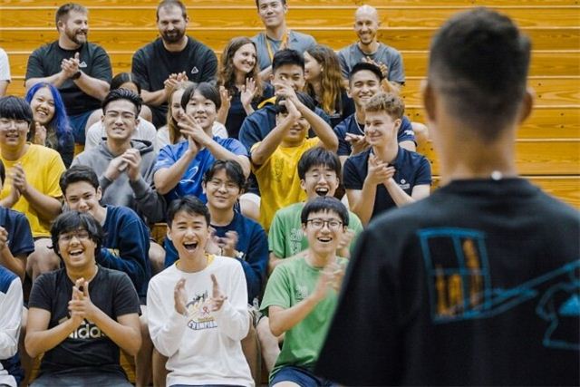 A group of people posing for a photo

Description automatically generated with medium confidence